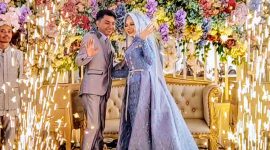 Pasangan Neng Riani dan Tito Aji Waluyo. (Foto: Momon Suparman).