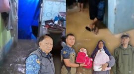 Pihak Kelurahan Sukajaya serahkan bantuan untuk korban banjir. (Photo Asrahi).