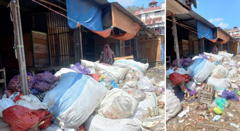 Nampak depan gardu Pasar Baraka, lapak penjual tertutup gunungan sampah